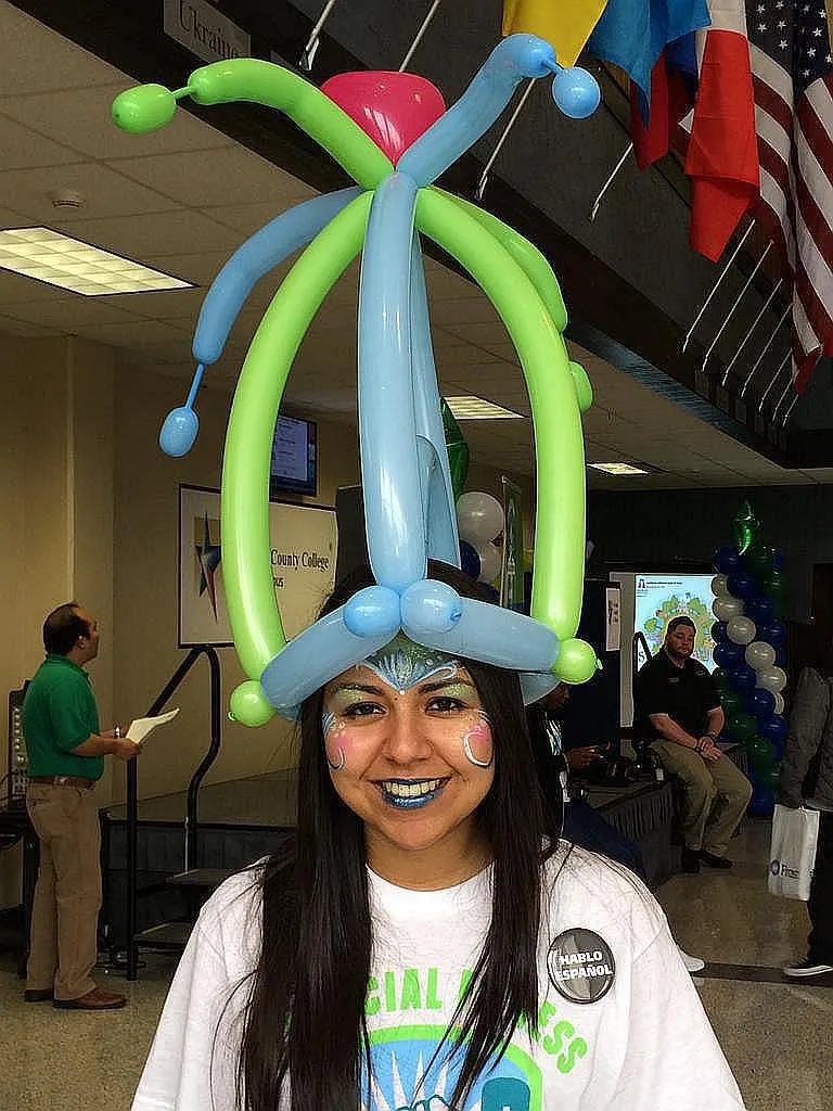 Balloon Hat Wearing Mermaid Face Painting